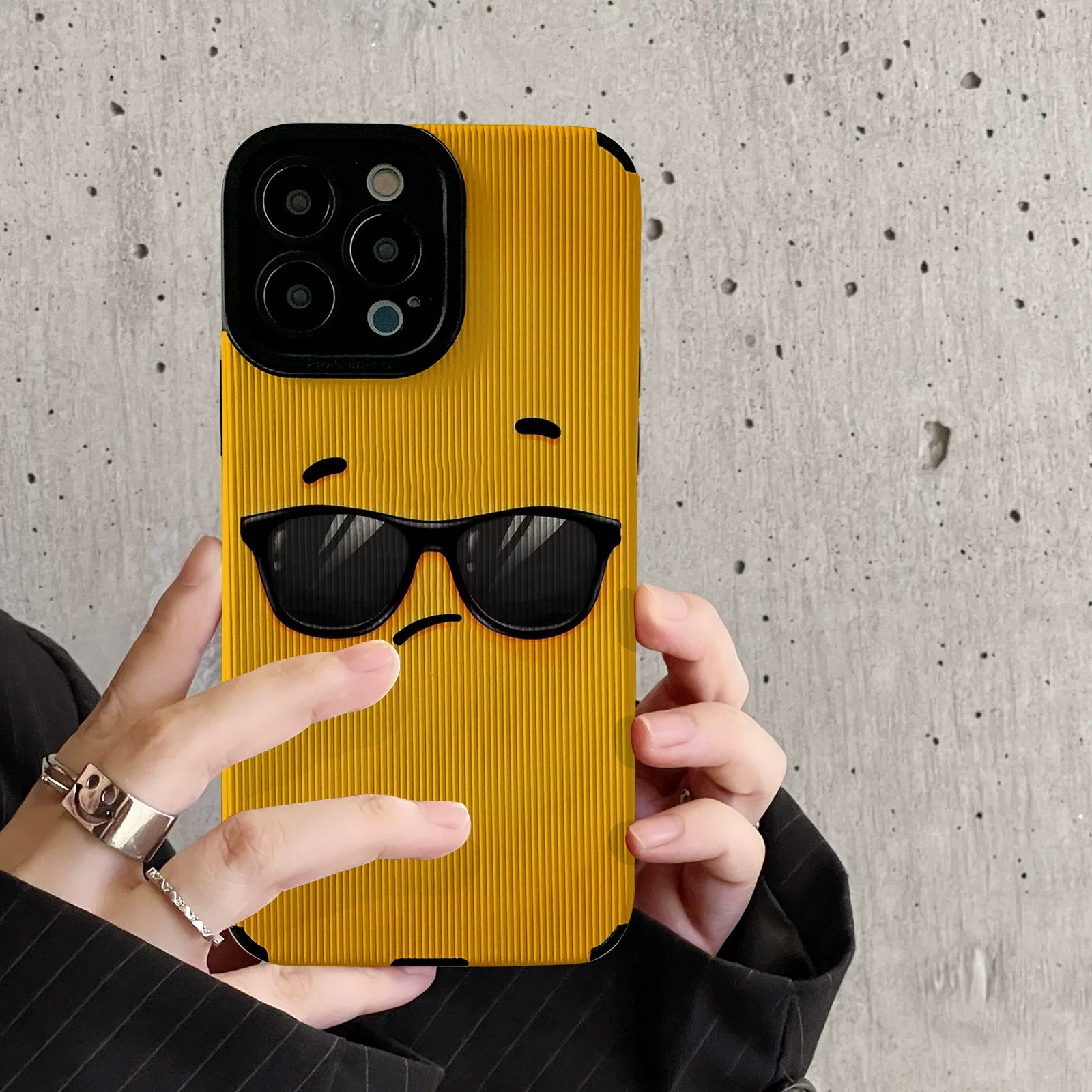 Apple 17pmx phone case, yellow background, sunglasses, cool expression